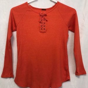 Poof Girl orange top for girls. Size XL.